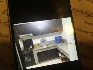 ein Modell einer Küche mit Herd in der Unterkunft Marrakech village touristique in Marrakesch