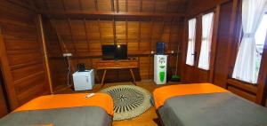 TV o dispositivi per l'intrattenimento presso Palma Beach Resort