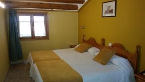 Katil atau katil-katil dalam bilik di San Miguel