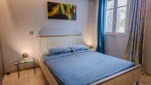 Postel nebo postele na pokoji v ubytování Les Brisants 21