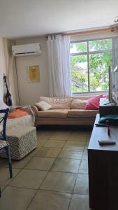 Postel nebo postele na pokoji v ubytování Quarto Pacífico