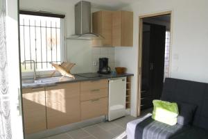 Køkken eller tekøkken på Maison 2 pièces 2 couchages Dolus d'Oléron DDO000-024