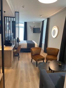 Posezení v ubytování Hotel Le Charme de la Semois