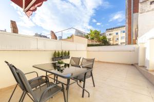 Un balcon sau o terasă la Alos Apartments Paseo de Gracia-Diagonal