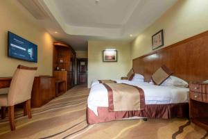 Postel nebo postele na pokoji v ubytování Mbale Resort Hotel