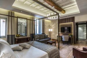 TV a/nebo společenská místnost v ubytování Hotel Martis Palace