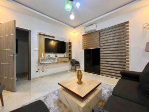 TV o dispositivi per l'intrattenimento presso Résidence Atlantis F2 avec balcon vue sur mer