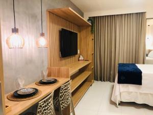 Ένα ή περισσότερα κρεβάτια σε δωμάτιο στο MALIA BEACH EXPERIENCE - FLAT ESTÚDIO LOCAÇÃO - Muro Alto - Porto de Galinhas +104 φωτογραφίες