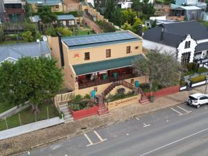 an overhead view of a building with a solar roof at Suntouched Inn in Napier +9 photos