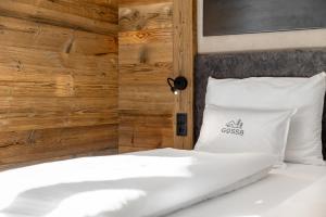 Postel nebo postele na pokoji v ubytování Chalet-Suite Wasser