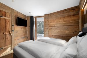 Postel nebo postele na pokoji v ubytování Chalet-Suite Wasser