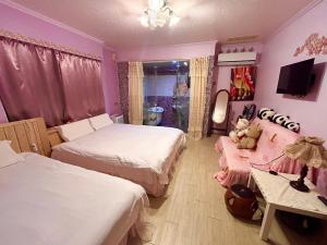 Postel nebo postele na pokoji v ubytování Love in Pearl B&B