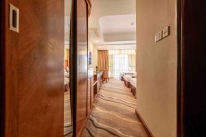Postel nebo postele na pokoji v ubytování Mbale Resort Hotel