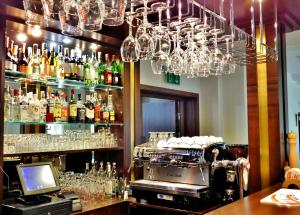 a bar with a bar equipotent at Hotel Świętoborzec in Łobez