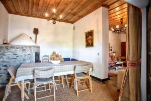 a dining room with a table and chairs at Charming Villa with Private Pool in Lamego in Lamego