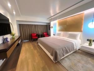 Voodi või voodid majutusasutuse Eko Hotel Main Building toas