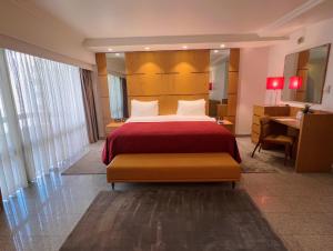 Voodi või voodid majutusasutuse Eko Hotel Main Building toas