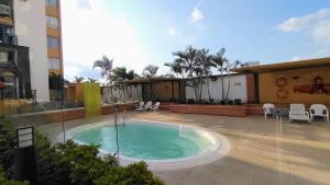 Kolam renang di atau dekat dengan Habitación Privada en Apartamento Compartido - La Concordia