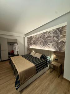 Posteľ alebo postele v izbe v ubytovaní Hotel Corallo + 37 fotografií