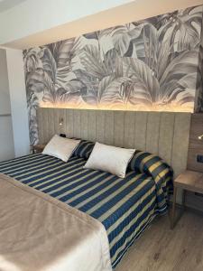 Posteľ alebo postele v izbe v ubytovaní Hotel Corallo