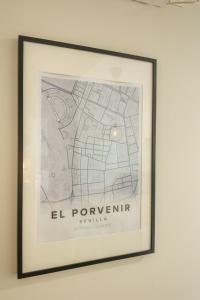 a framed picture of a map on a wall at Charming Apartment with private patio at Plaza de España by OCityzen in Seville