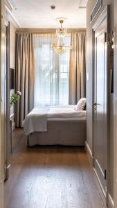 Llit o llits en una habitació de Hotel Kungsträdgården