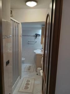 a bathroom with a shower and a toilet and a sink at Casa Eden in Ventimiglia +82 photos