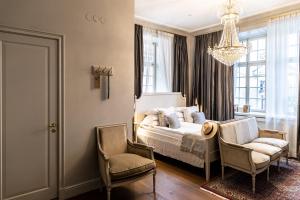 Llit o llits en una habitació de Hotel Kungsträdgården