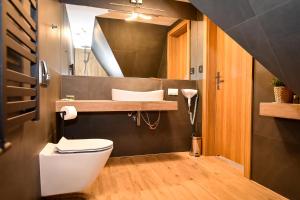 Kúpeľňa v ubytovaní Apartamenty Pod Tatrzańskim Niebem + 37 fotografií