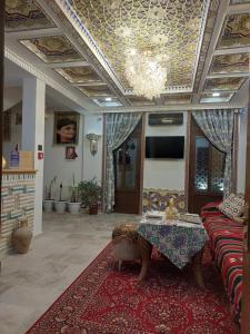 Гостиная зона в Hotel Gulnaraxanum Boutique This hotel is nearby the center of the old city Every room decorated in the unique style