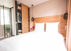 Postel nebo postele na pokoji v ubytování Camping - Parc aquatique - ccafh0f