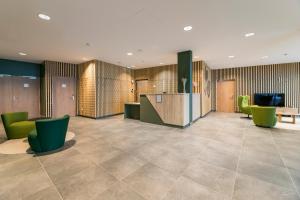 Ο χώρος του λόμπι ή της ρεσεψιόν στο Lagrange Vacances Le Cristal de Piau +49 φωτογραφίες