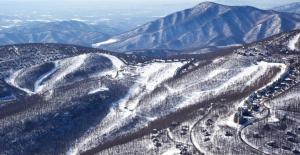 an aerial view of a snow covered mountain at Afton Clubhouse in Afton
