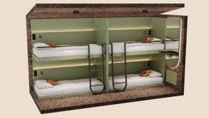 Letto o letti in una camera di Pods by The Usual Rotterdam