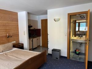 Voodi või voodid majutusasutuse Gästehaus Tauscher am Haldensee toas