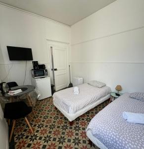 Postel nebo postele na pokoji v ubytování ALBI Chambres