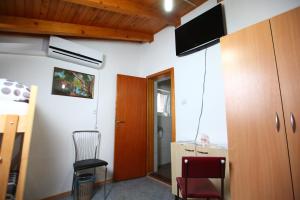 TV i/ili multimedijalni sistem u objektu Hostel Cuba