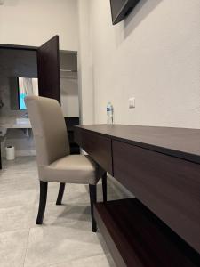 TV a/nebo společenská místnost v ubytování Hotel Margarita