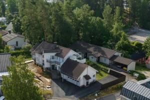 an overhead view of a row of houses in a suburb at Villa Lumikontupa in Jyväskylä
