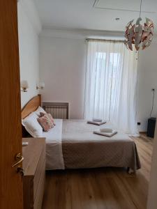 Postel nebo postele na pokoji v ubytování Guest House Rome Termini Station