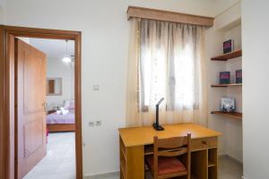 Ένα ή περισσότερα κρεβάτια σε δωμάτιο στο Perivolia suburb apts
