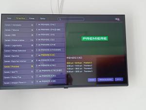 Et tv og/eller underholdning på Aluguel casa azul