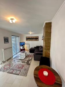 Un lugar para sentarse en Micic Apartment 1 Divcibare