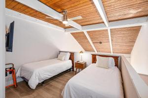 En eller flere senge i et værelse på Maalaea Banyans 411 + 30 billeder