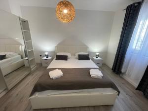 Posteľ alebo postele v izbe v ubytovaní Primus Štrbić