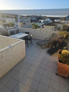 Balkón nebo terasa v ubytování La Casita de la Playa 24-38
