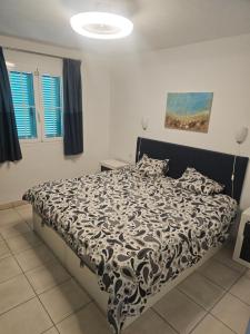 Postel nebo postele na pokoji v ubytování La Casita de la Playa 24-38