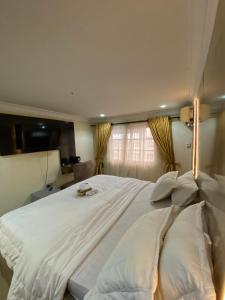 A bed or beds in a room at Diganga Reloaded