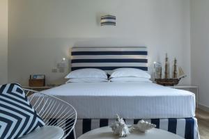 Voodi või voodid majutusasutuse Murè Hotel Numana toas
