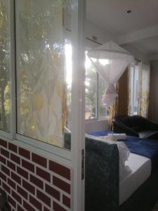 Postel nebo postele na pokoji v ubytování Summer villa Ambagolla